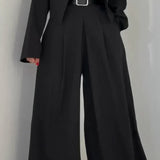 Justy | Elegancki czarny garnitur